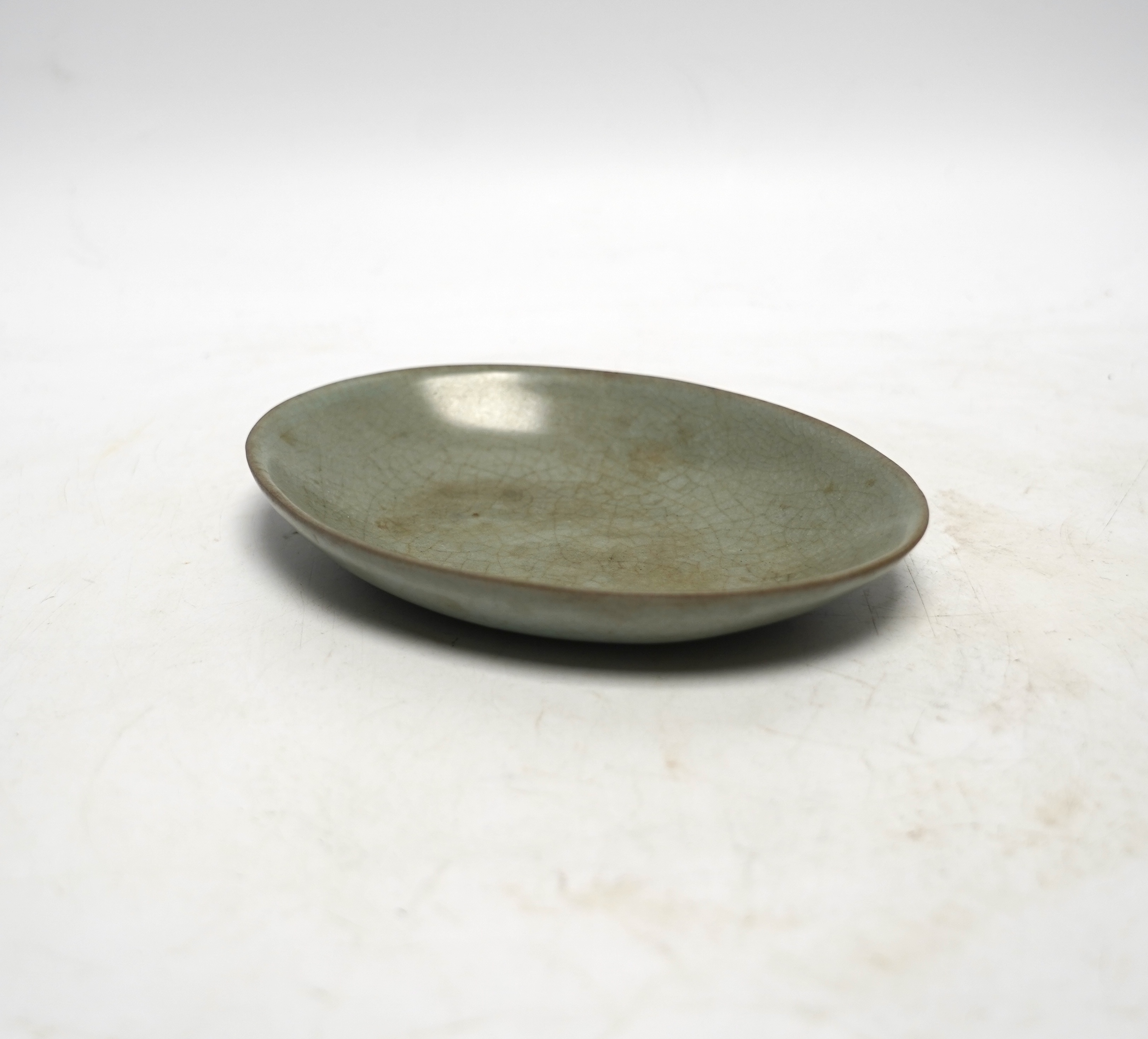 A Chinese oval celadon crackle glaze dish, 15.5cm wide